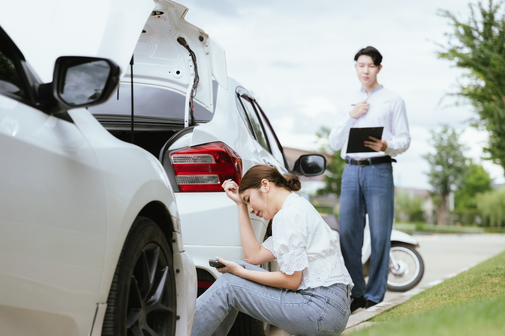 woman who need assistance from a Denver car accident lawyer after a car accident